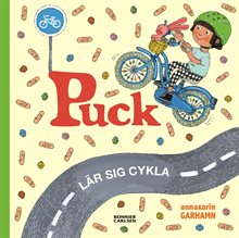 Puck lär sig cykla